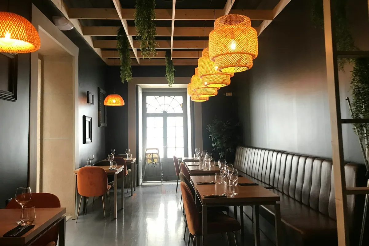 A contemporary restaurant interior with warm lighting