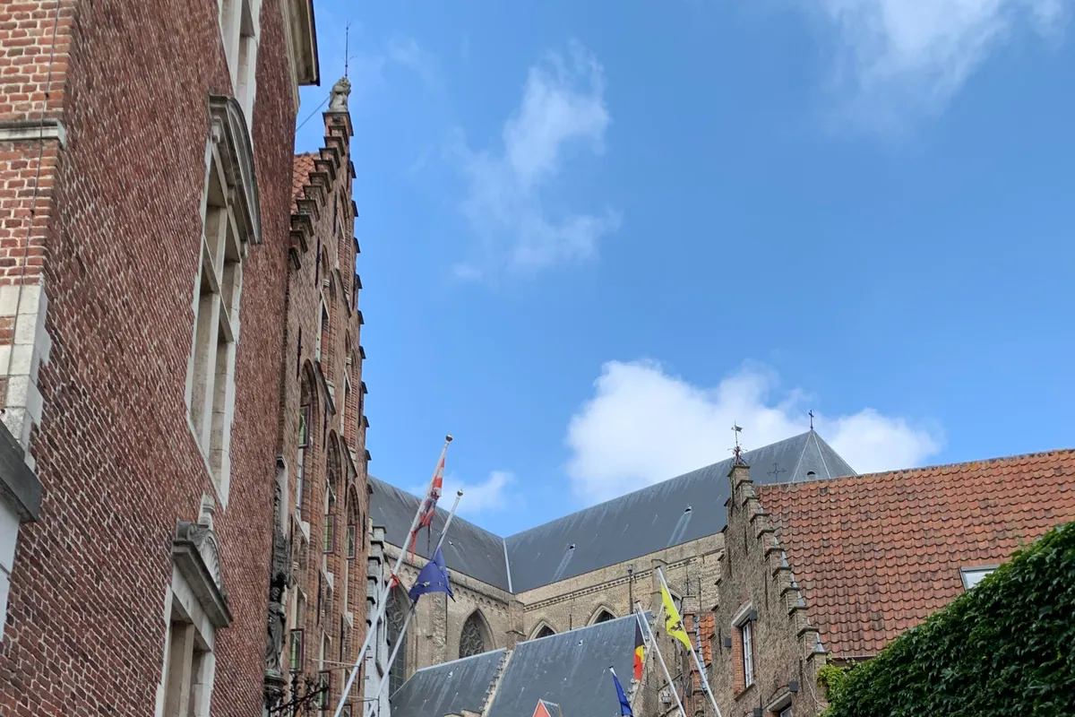 A De Lijn bus on Heilige-Geeststraat in Bruges